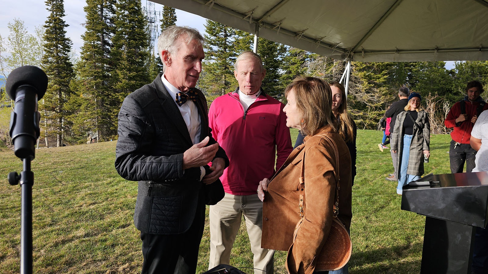 Bill Nye the Science Guy speaks with Max Chapman and his wife and daughter after his speech in Jackson on Saturday to christen the new planetarium.