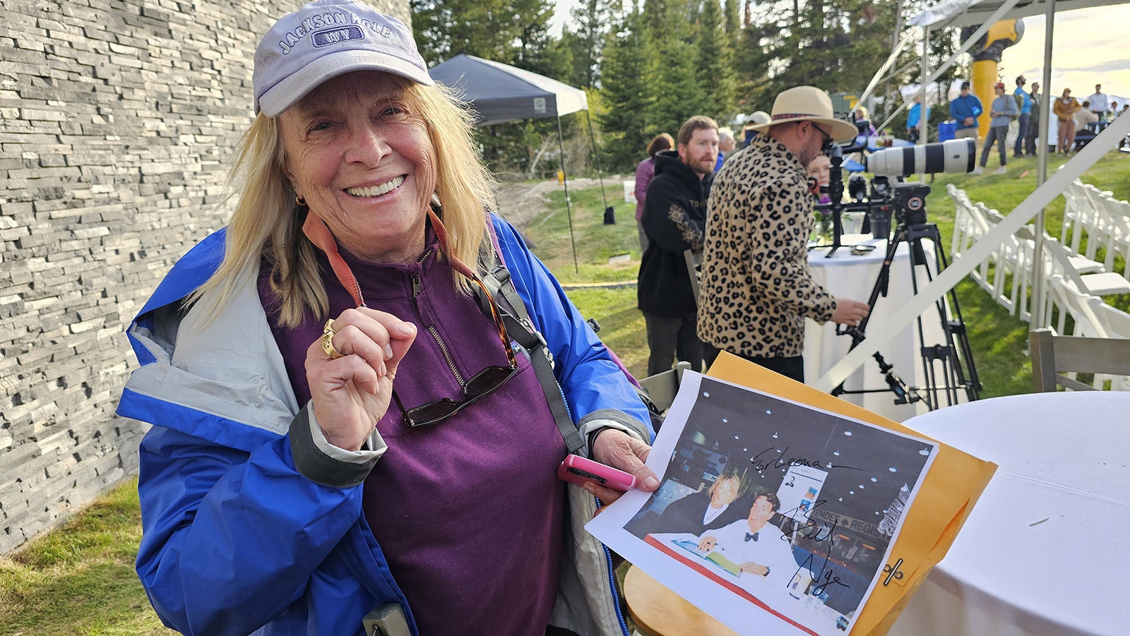 Retired teacher Leona Wunnenberg shows off the photograph she got Bill Nye to sign of her with the Science Guy during a 2005 conference in Reno.