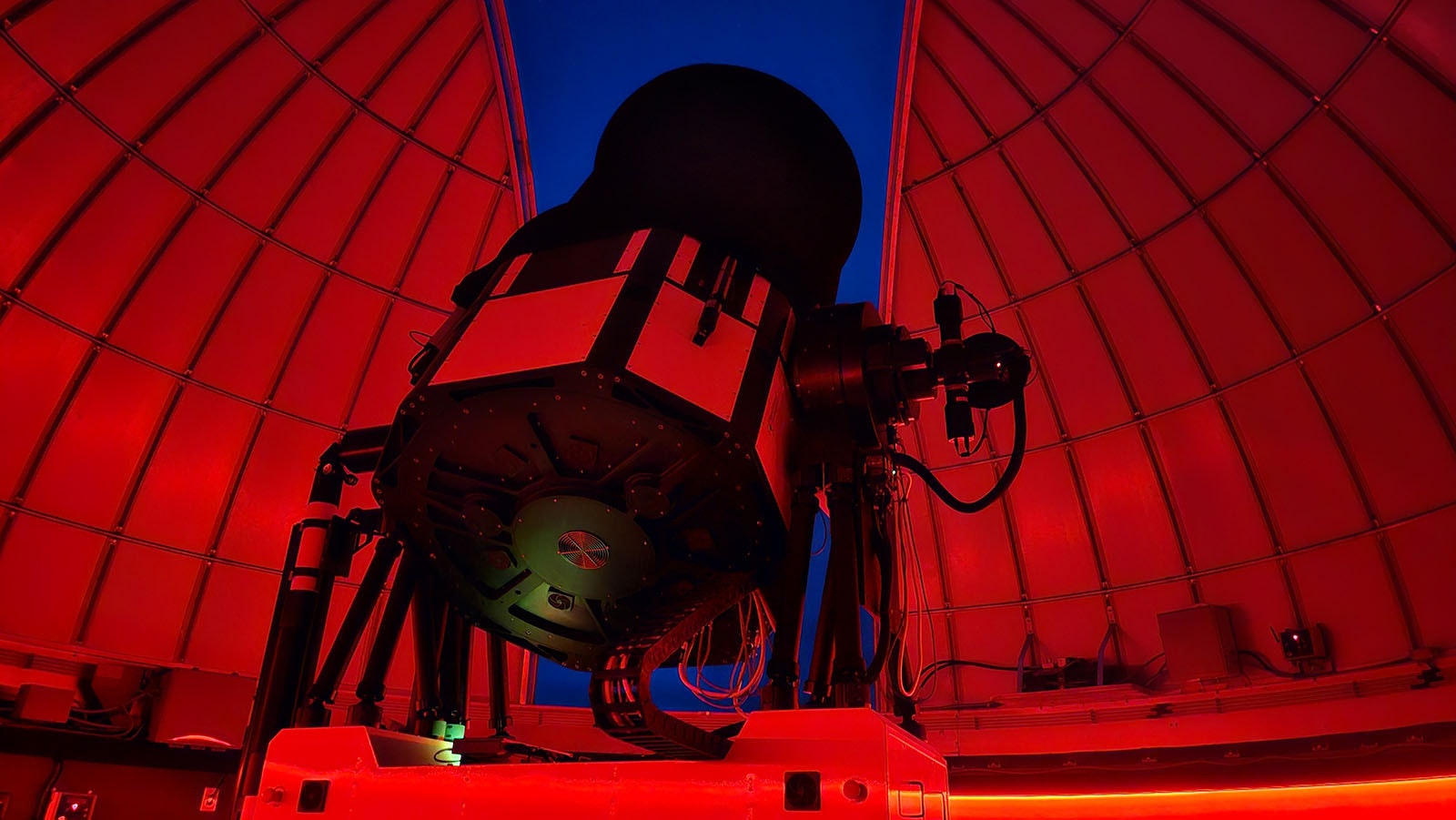 The massive 1-meter telescope seems immovable. Until, like an alien robot, it suddenly moves.