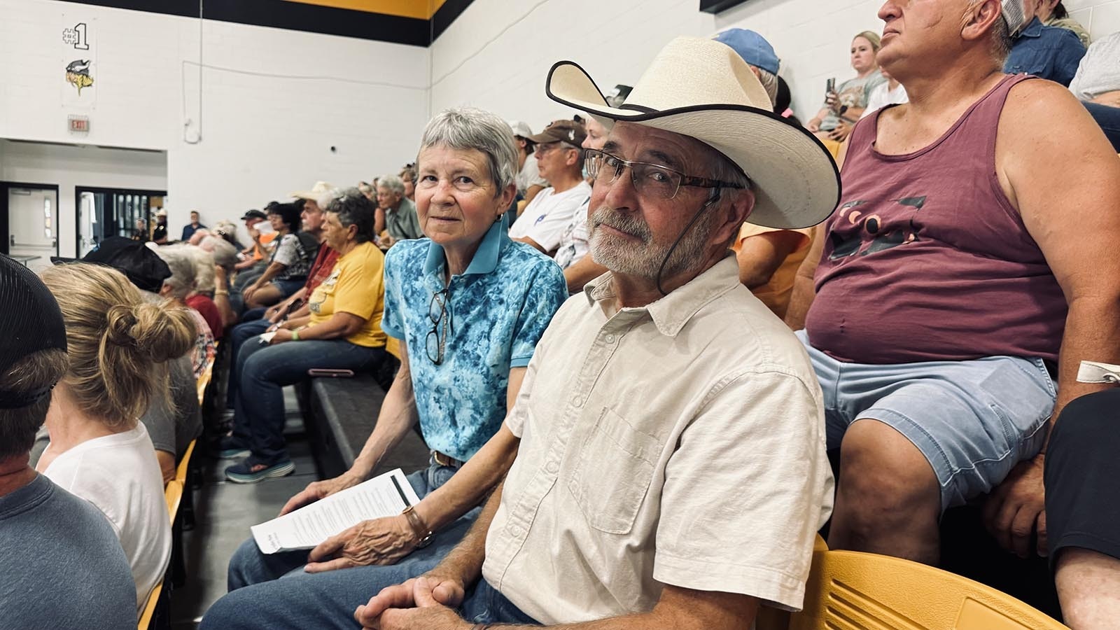 On left, Anne Lee and her husband, Tom Lee, got a firsthand look at the merging of the Haystack and Pleasant Valley fires late Tuesday when they visited a knoll near their home located at Road 3 and Tank Farm Road, south of U.S. Highway 26.