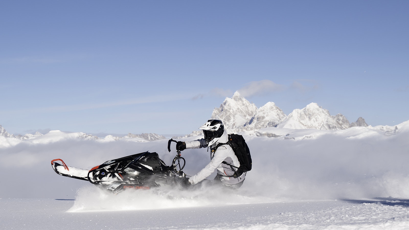 Polaris is promoting its latest lineup of snowmobiles by putting them through their paces in the pristine snow of Wyoming’s Teton Range. The company uses the Cowboy State to showcase the machines as the ultimate toy for backcountry adventure.