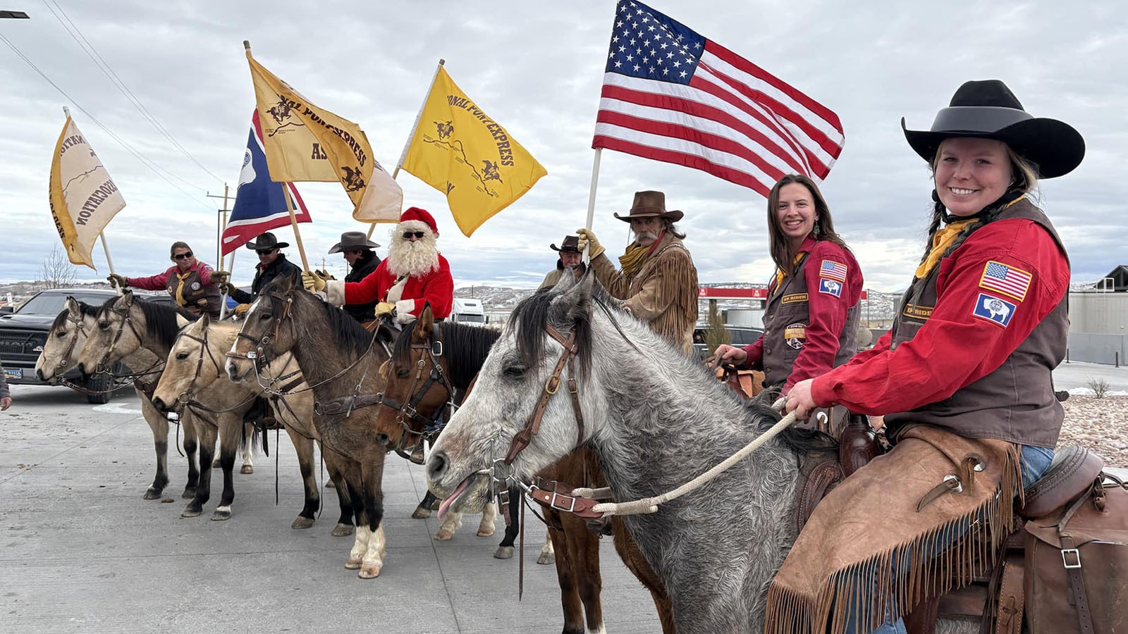 Members of the Sweetwater County Chapter of the National Pony Express Association delivered Christmas cards between Green River and Rock Springs on Saturday.