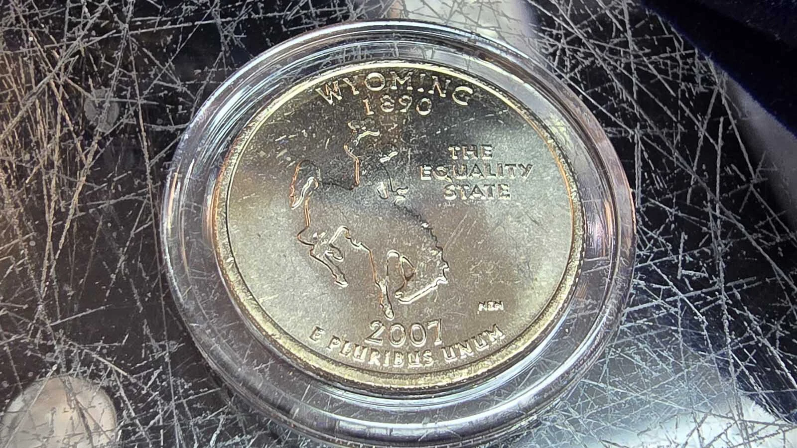 Wyoming's state quarter has some interesting errors, including a die break that makes it look suspiciously like the horse is pooping. This quarter doesn't have that error.