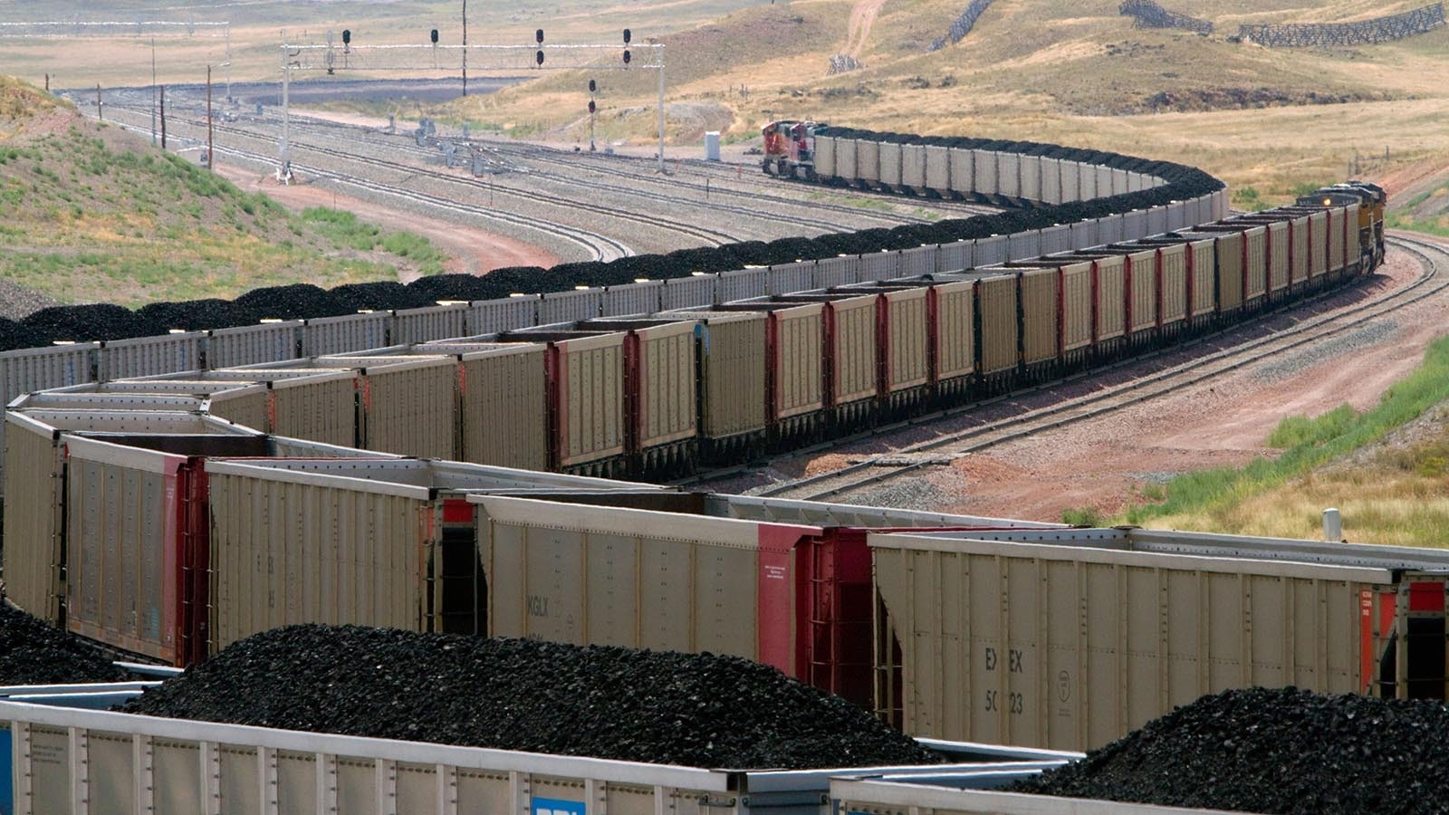 Coal trains leaving the Powder River Basin in northeast Wyoming full and returning empty.