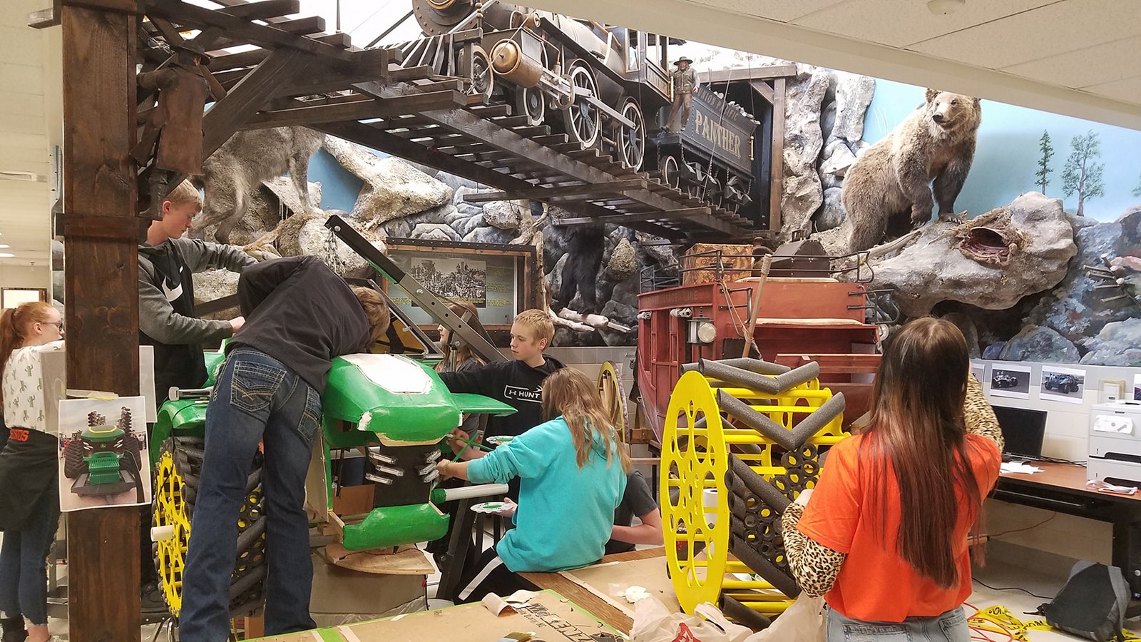 Students work on creating a John Deere-like tractor that could be used on Mars.