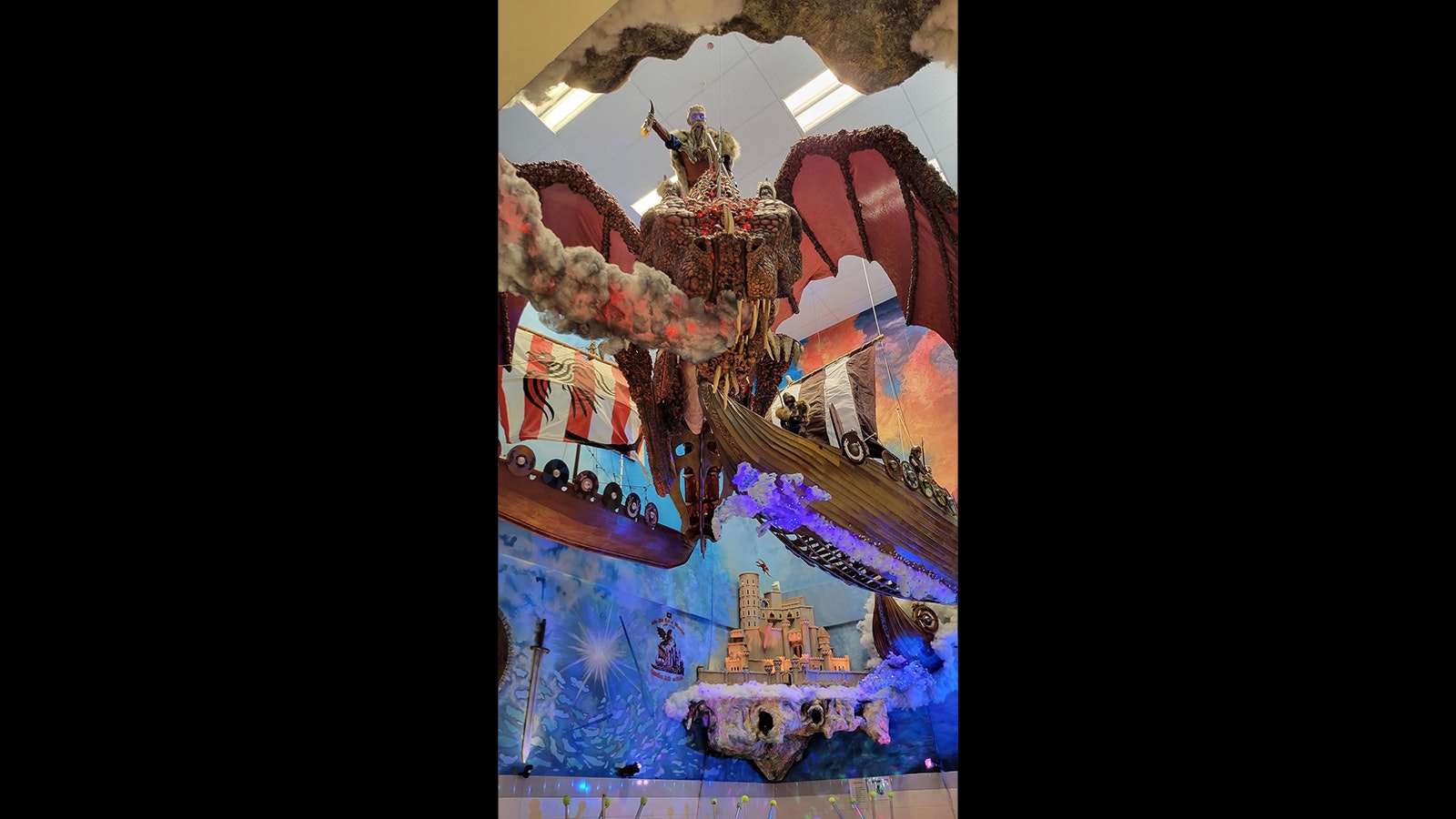 The viking display includes a massive dragon with a zombie-like rider, three Viking ships and a castle.
