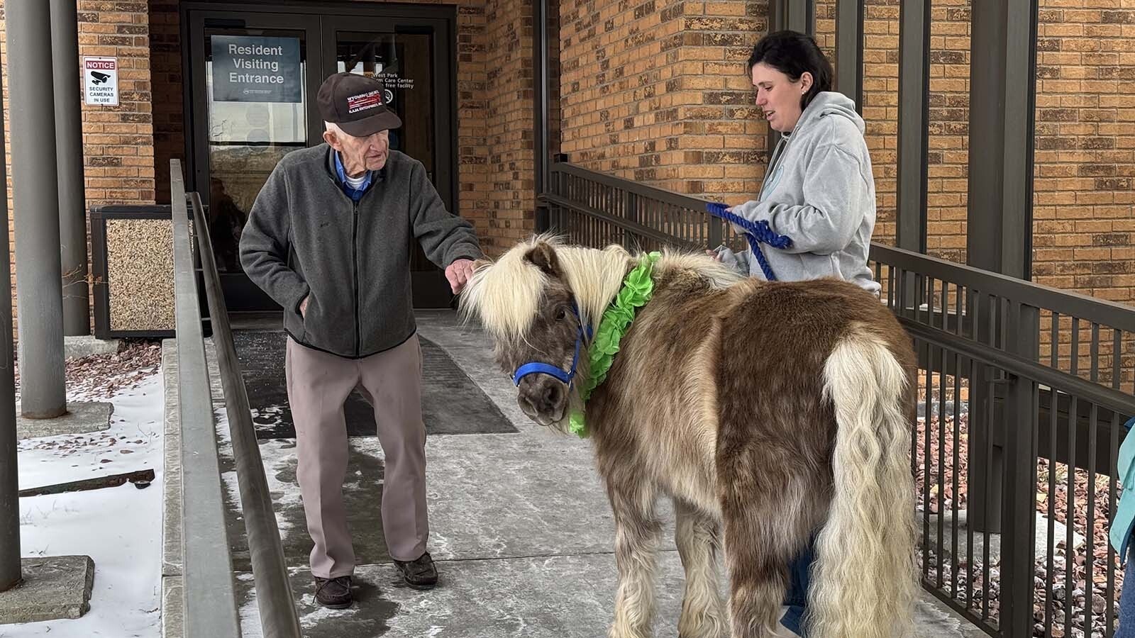 A pony named Star is greeted on the way up the ramp to the Long Term Care Facility at Cody Regional Health.