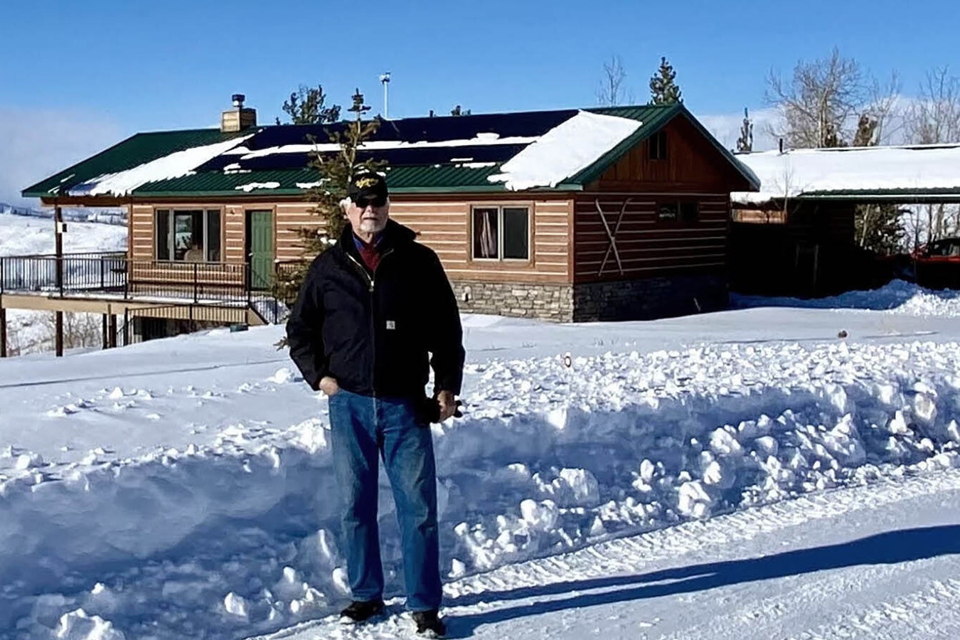 Jim Jacobson stands in front of his home in Bondurant, Wyoming. He said his property taxes have more than doubled from 2020-2023.