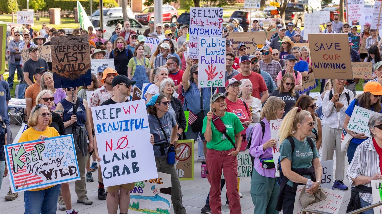 An estimated 300-400 people gathered at the Wyoming Capitol in Cheyenne on Thursday, June 26, 2025, to rally in opposition of U.S. Sen. Mike Lee's proposal to sell off parcels of federal public land.