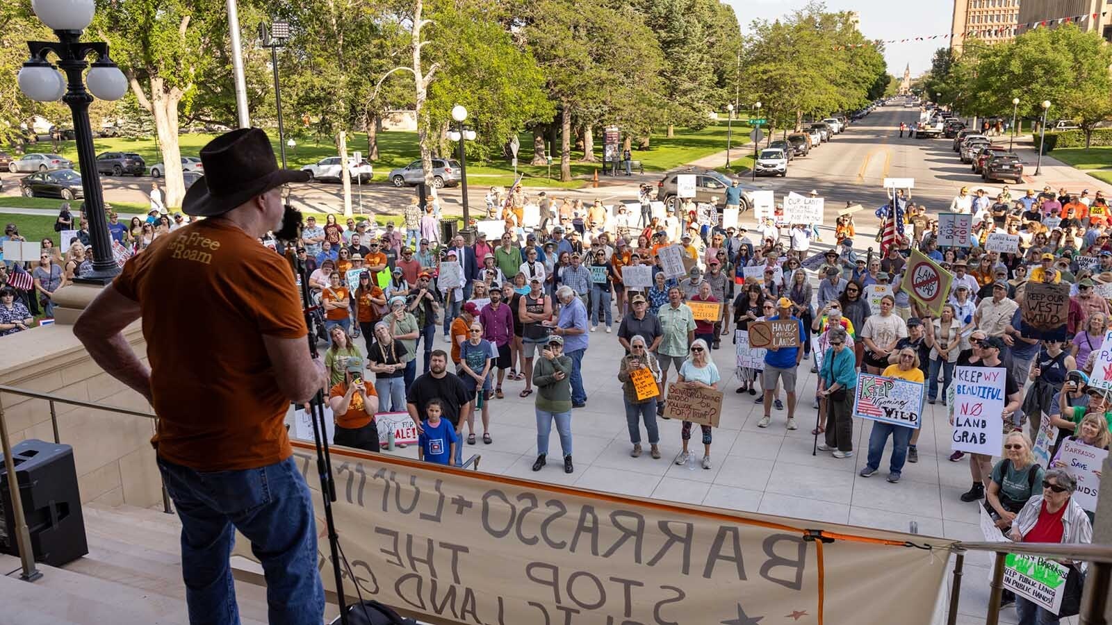 An estimated 300-400 people gathered at the Wyoming Capitol in Cheyenne on Thursday, June 26, 2025, to rally in opposition of U.S. Sen. Mike Lee's proposal to sell off parcels of federal public land.