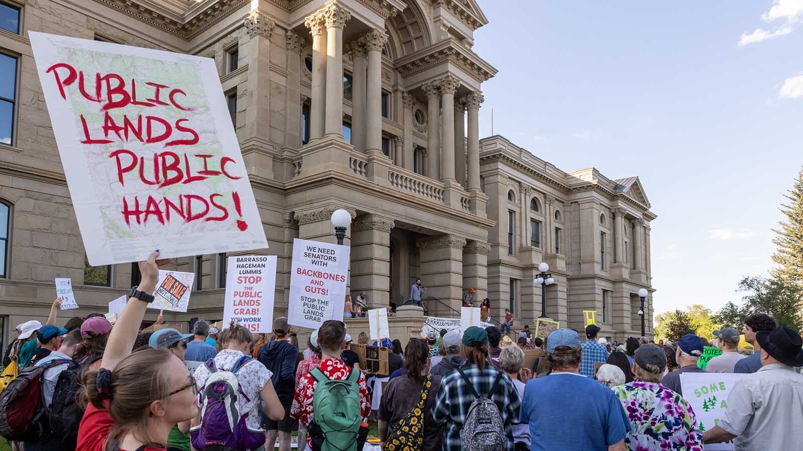 An estimated 300-400 people gathered at the Wyoming Capitol in Cheyenne on Thursday, June 26, 2025, to rally in opposition of U.S. Sen. Mike Lee's proposal to sell off parcels of federal public land.