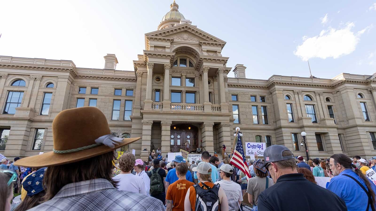 An estimated 300-400 people gathered at the Wyoming Capitol in Cheyenne on Thursday, June 26, 2025, to rally in opposition of U.S. Sen. Mike Lee's proposal to sell off parcels of federal public land.