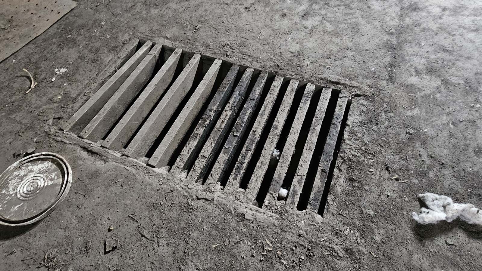 A large drain in the middle of the floor for water to escape is among features original to the building.