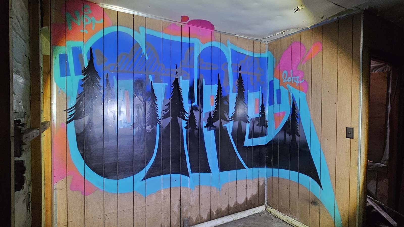 Some of the graffiti in the pumphouse is fancy, even if hard to read.