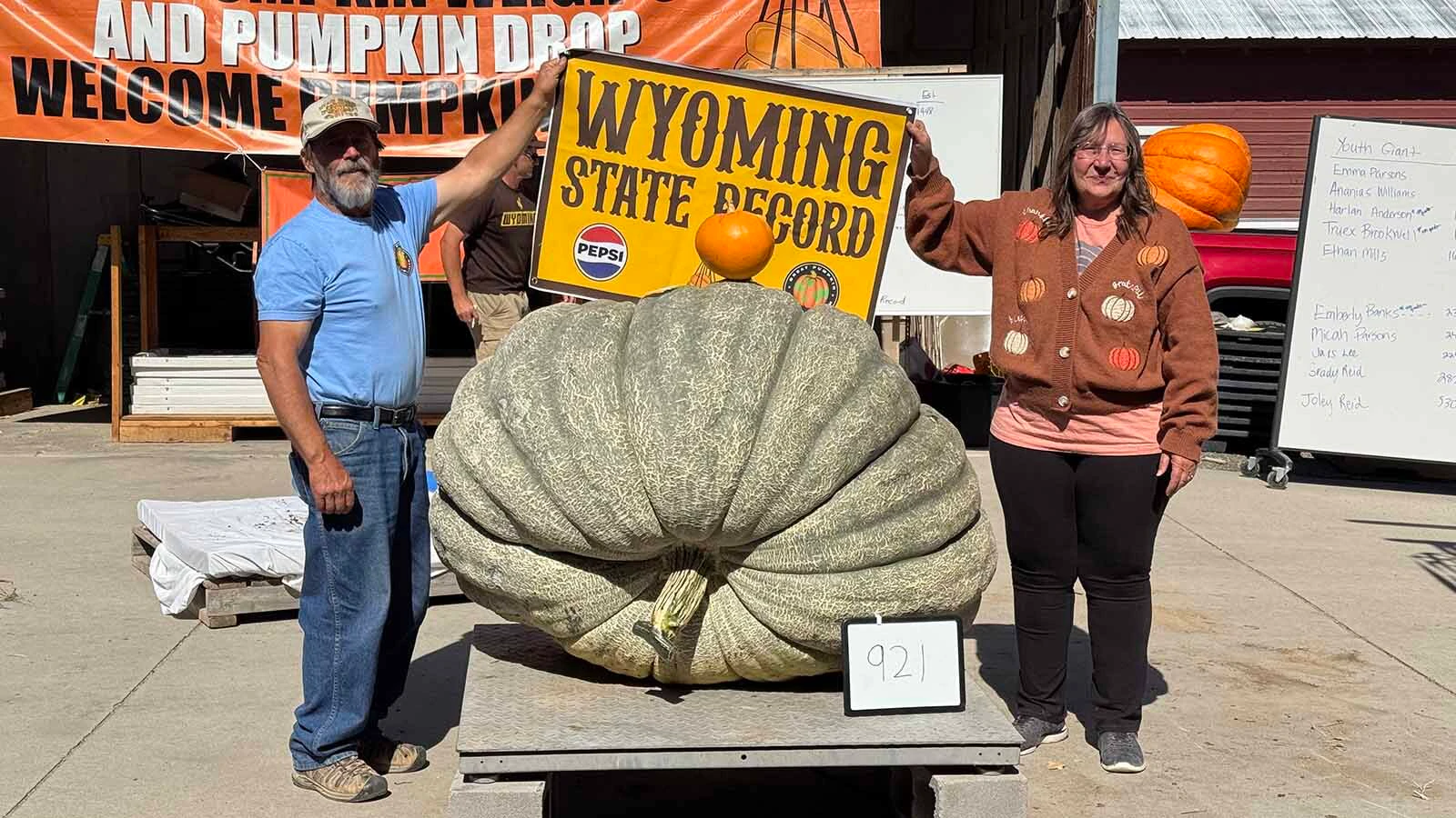 Ron and Connie Hoffman of Riverton with their 921-pound green squash at the 2026 Wyoming State Champion Weigh-off and Pumpkin Drop in Worland. This green squash set a new Wyoming state record, one of four state records at Saturday's event.