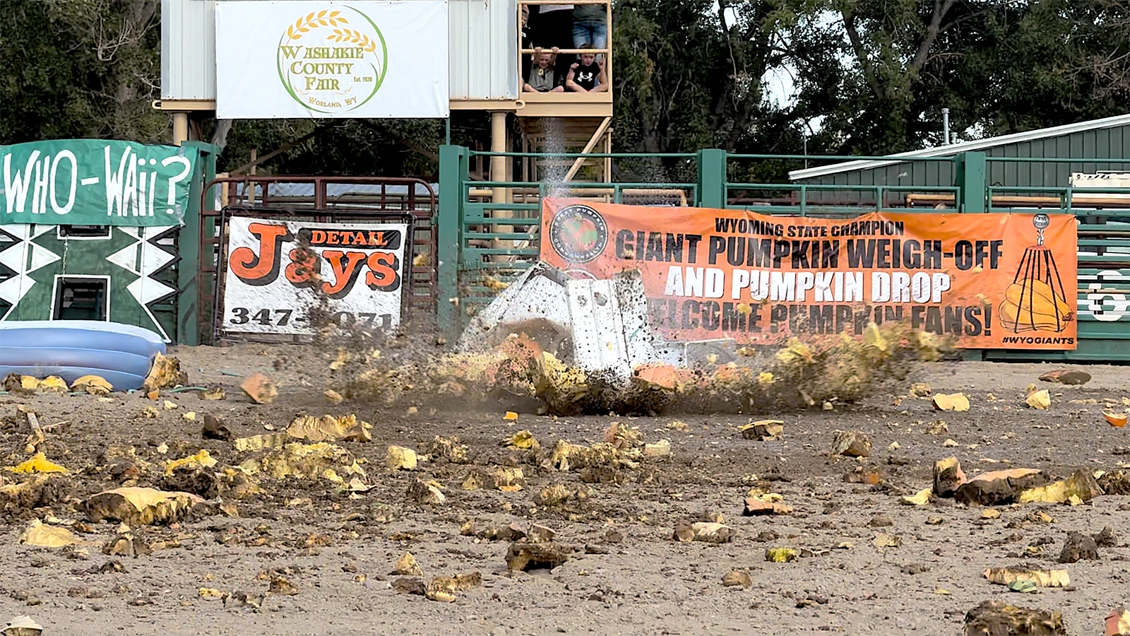 Chunks of pumpkin litter the Washakie County Fairgrounds arena in Worland as a giant squash obliterates an old clothes dryer when dropped from 200 feet Saturday, Sept. 26, 2026, at the Wyoming State Weigh-Off and Pumpkin Drop in Worland.