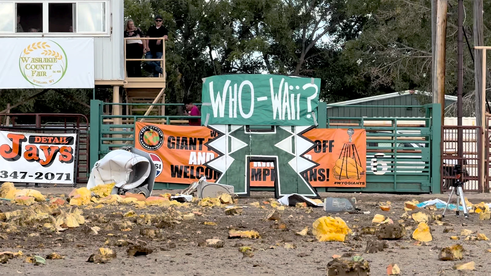 Chunks of pumpkin litter the Washakie County Fairgrounds arena in Worland after a giant squash obliterated an old clothes dryer when dropped from 200 feet Saturday, Sept. 26, 2026, at the Wyoming State Weigh-Off and Pumpkin Drop in Worland.