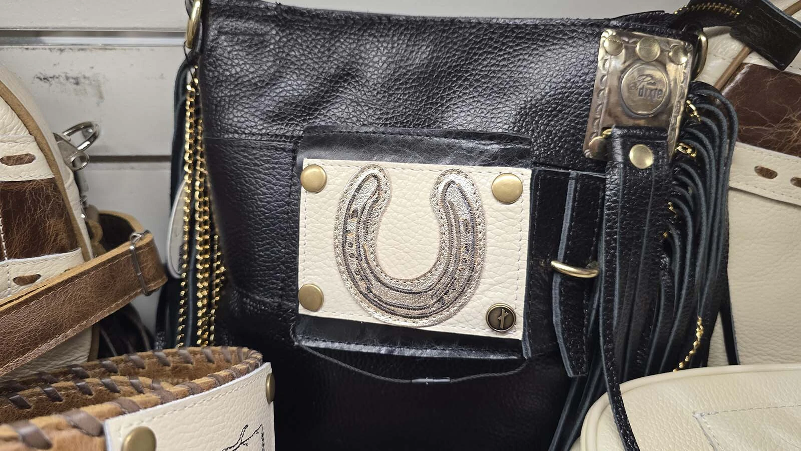 The horseshoe patch is removable.