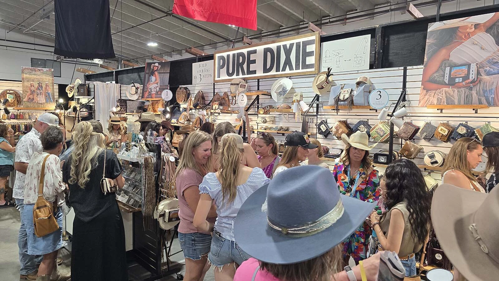 The Pure Dixie booth was frequently full of customers during Cheyenne Frontier Days. In this photo, there were more than 20 people crowding into the small booth at the same time.