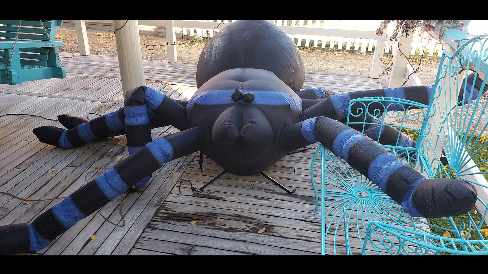 This giant inflatable spider is headed for the roof, where it will sit waiting to drop down on visitors.
