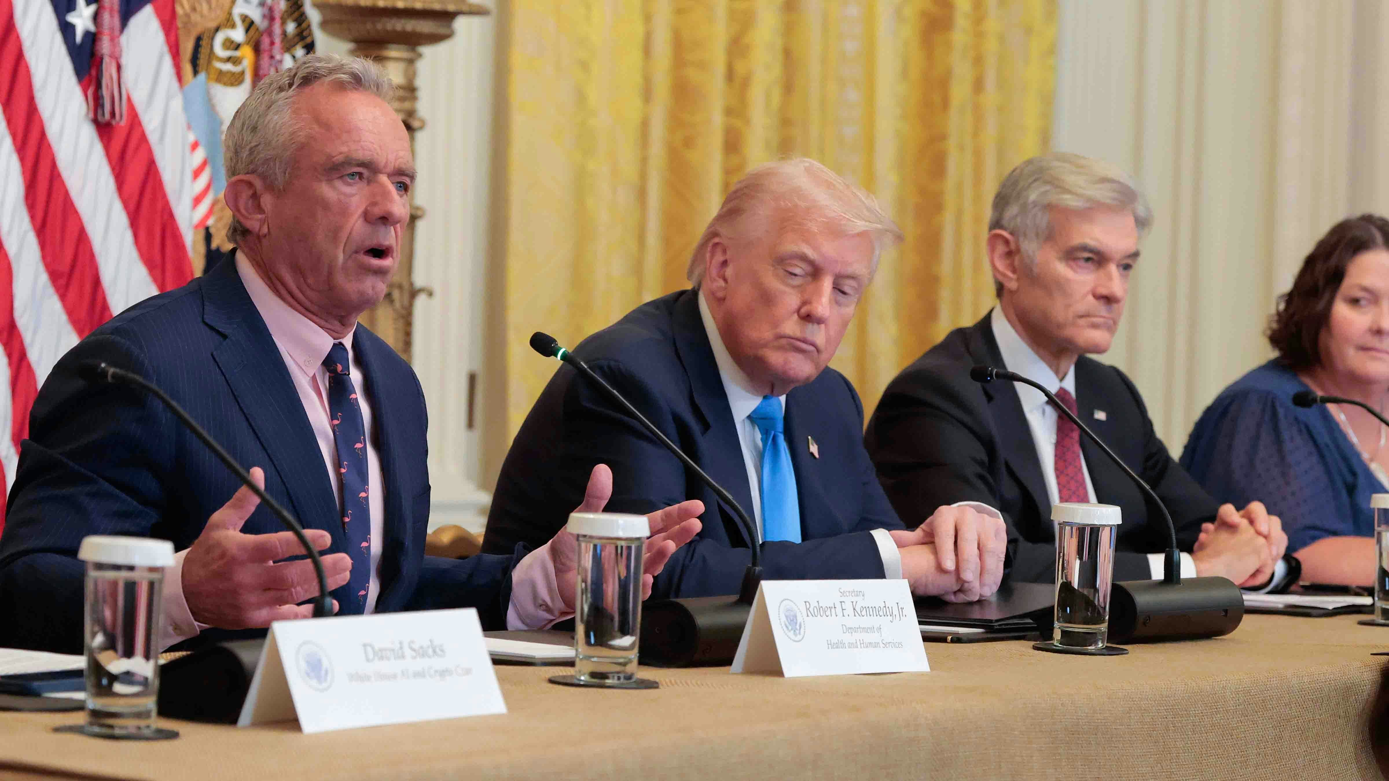 Health and Human Services Secretary Robert F. Kennedy Jr. (L) speaks during an event on Health Technology in the East Room of the White House with U.S. President Donald Trump
