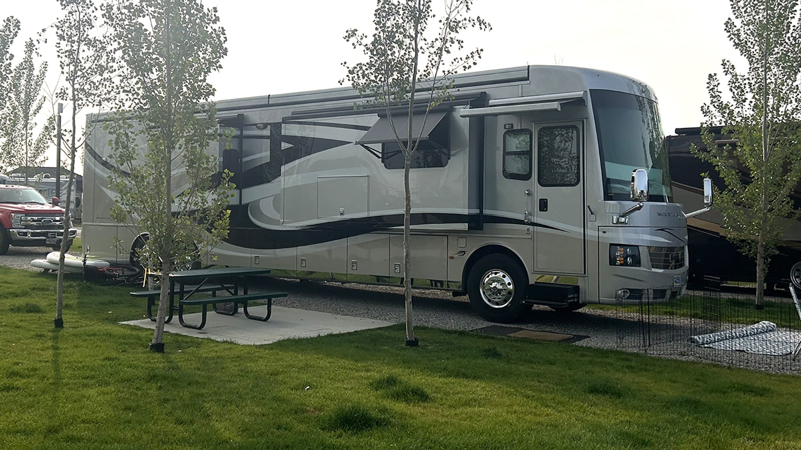 A Newmar Mountain Aire valued at around $600,000 is parked in a campground in Pinedale.