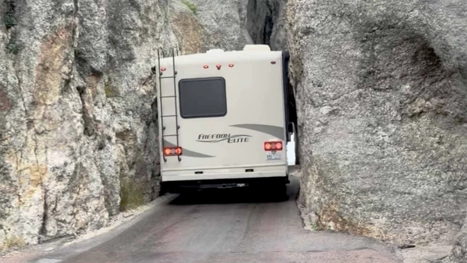 Denise Yelton and Todd Beaver were enjoying the Needles Highway in South Dakota’s Custer State Park when they saw a motorhome get stuck try to squeeze through the 8.4-foot-wide Needles Eye Tunnel.