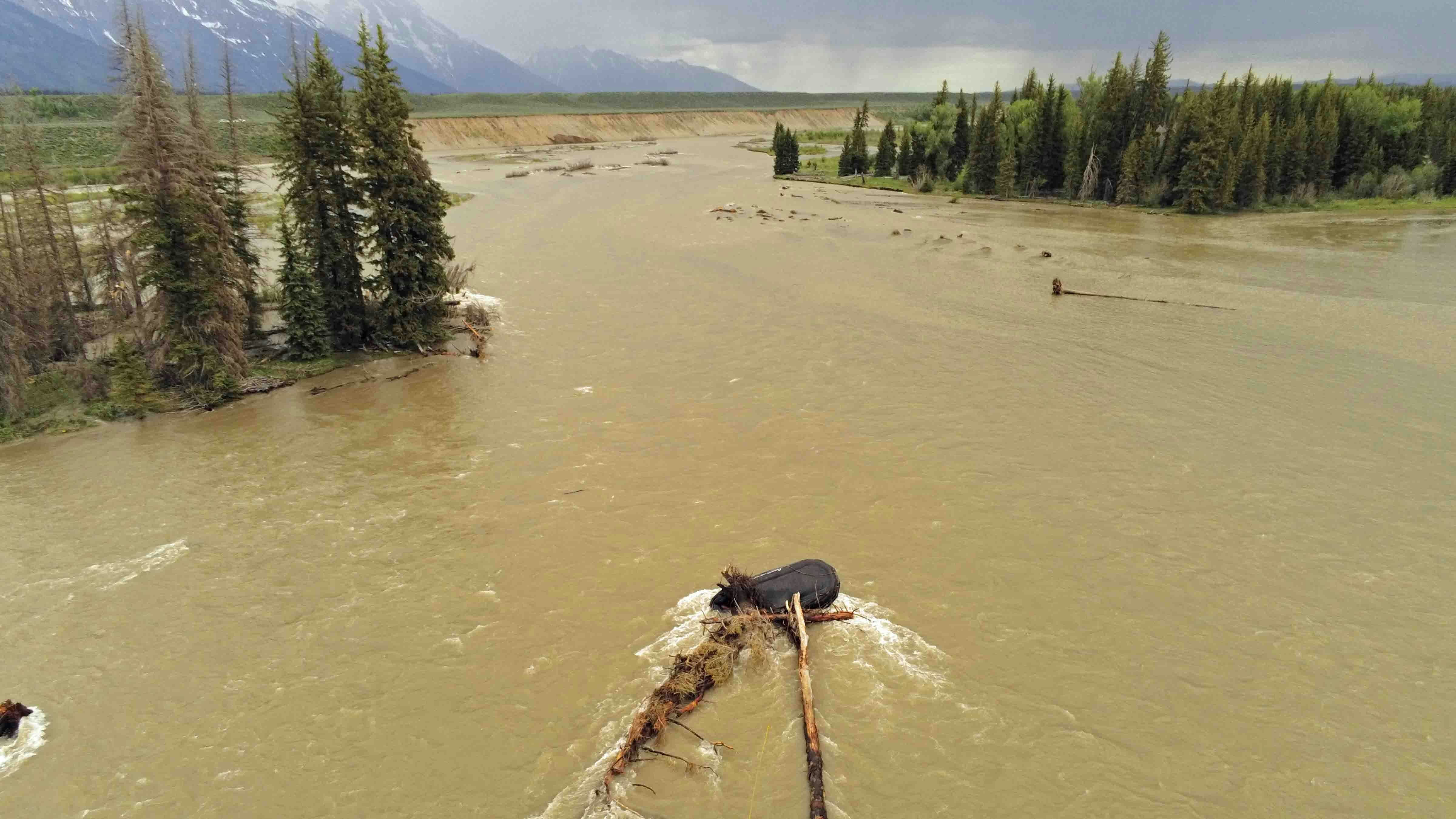 Commercial raft flipped after striking a snag in section of Snake River in Grand Teton National Park called “The Black Hole."
