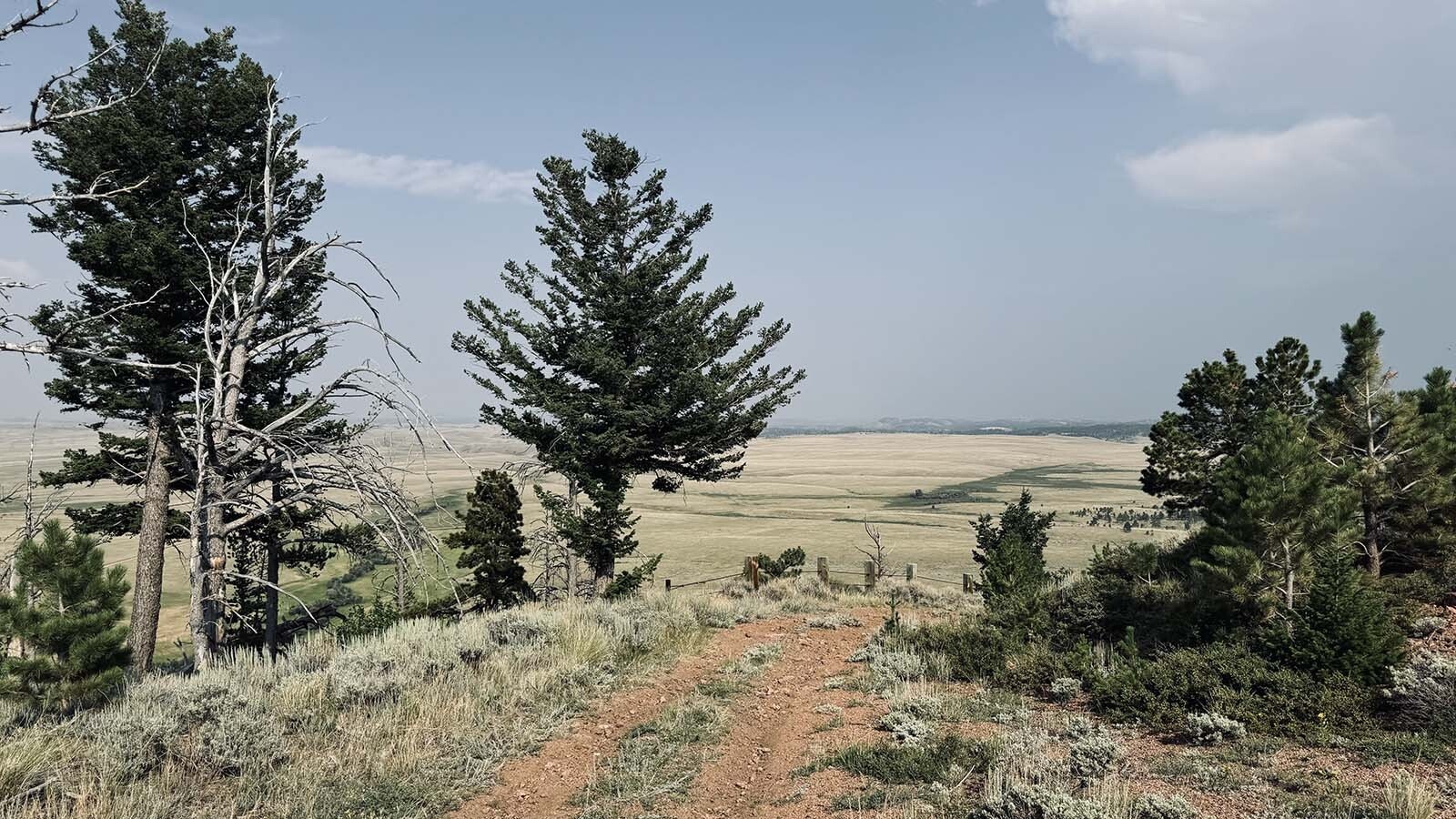 Roads traverse the landscape of the foothills above Laramie Plains in Albany County where several residents of the Fish Creek Ranch Preserve are fighting a battle to halt construction of a 500-megawatt wind farm proposed by a Spanish energy giant.