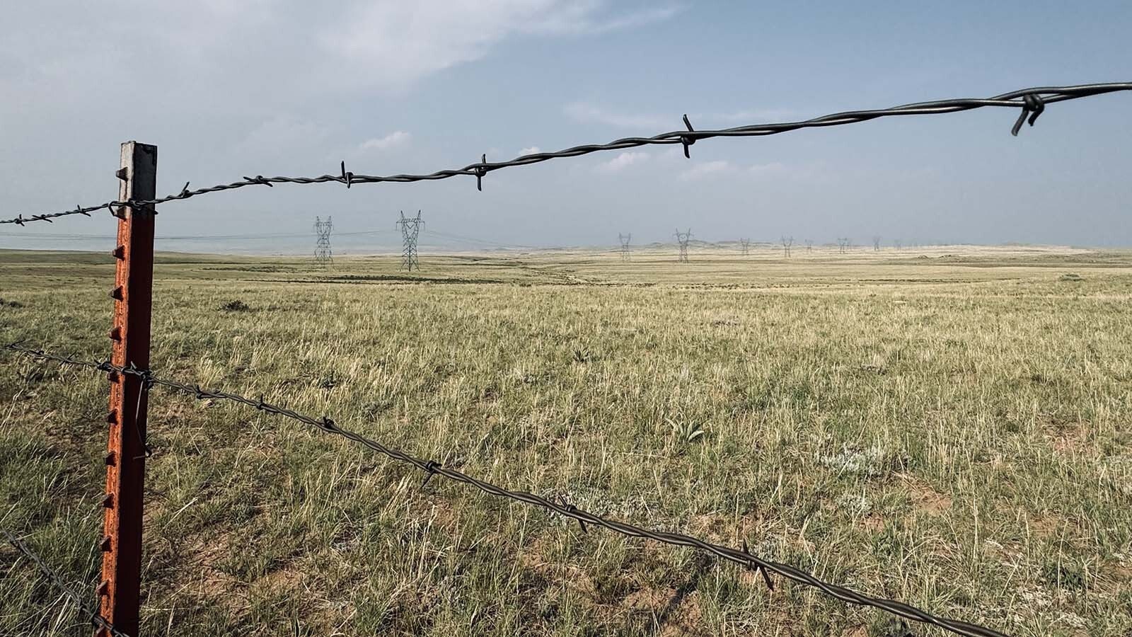 Above, a Spanish energy company wants to connect its proposed 500-megawatt wind farm with the 345-volt Ault-Craig transmission lines seen in the distance along the Laramie Plains. The lines are owned by the Western Area Power Administration, or WAPA, which is a western United States power marketer with the Department of Energy.