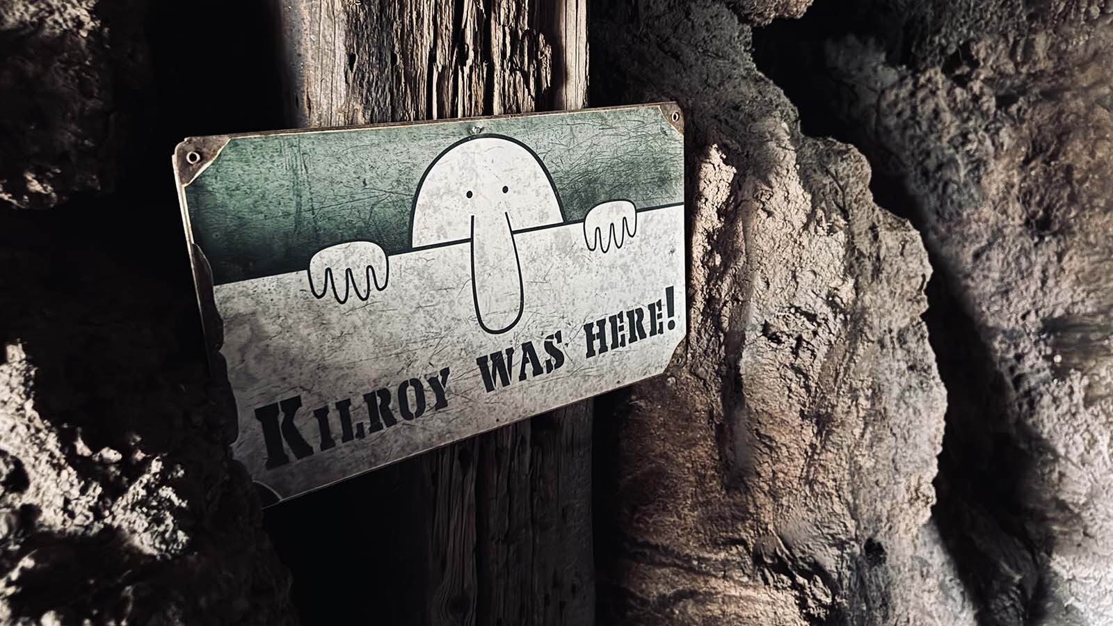 Above, John Davis posted a “Kilroy was here” sign inside the mine he had built for his grandchildren to play in. The sign is a meme that was popular during World War II.