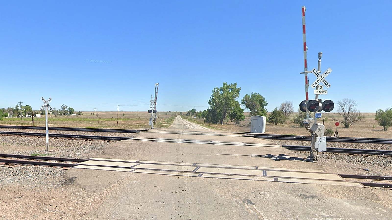 The railroad crossing on County Road 154 near Burns, Wyoming, about 30 miles east of Cheyenne.