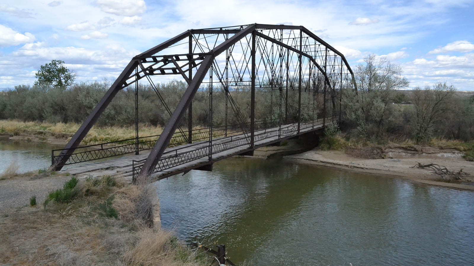 The Rairden Bridge over the Big Horn River in Manderson, Wyoming. It was built in 1916 originally, then later replaced and finally abandoned in 1979.