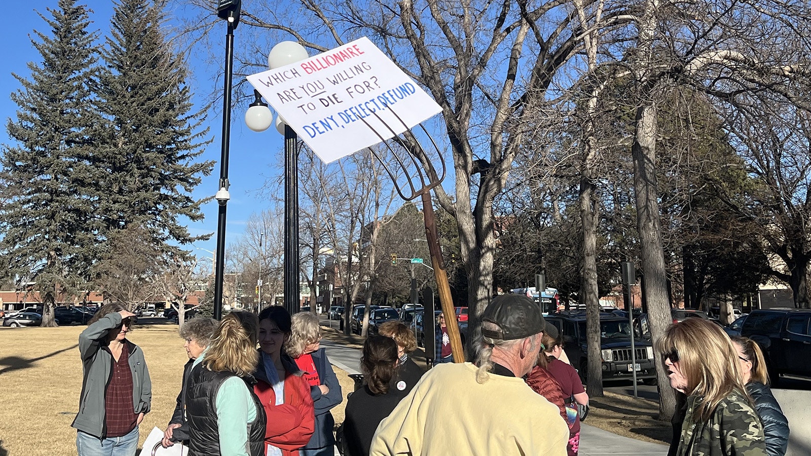 Around 150 Wyoming workers gathered outside the Capitol on Friday to protest moves by the Wyoming Legislature and Trump administration cuts.