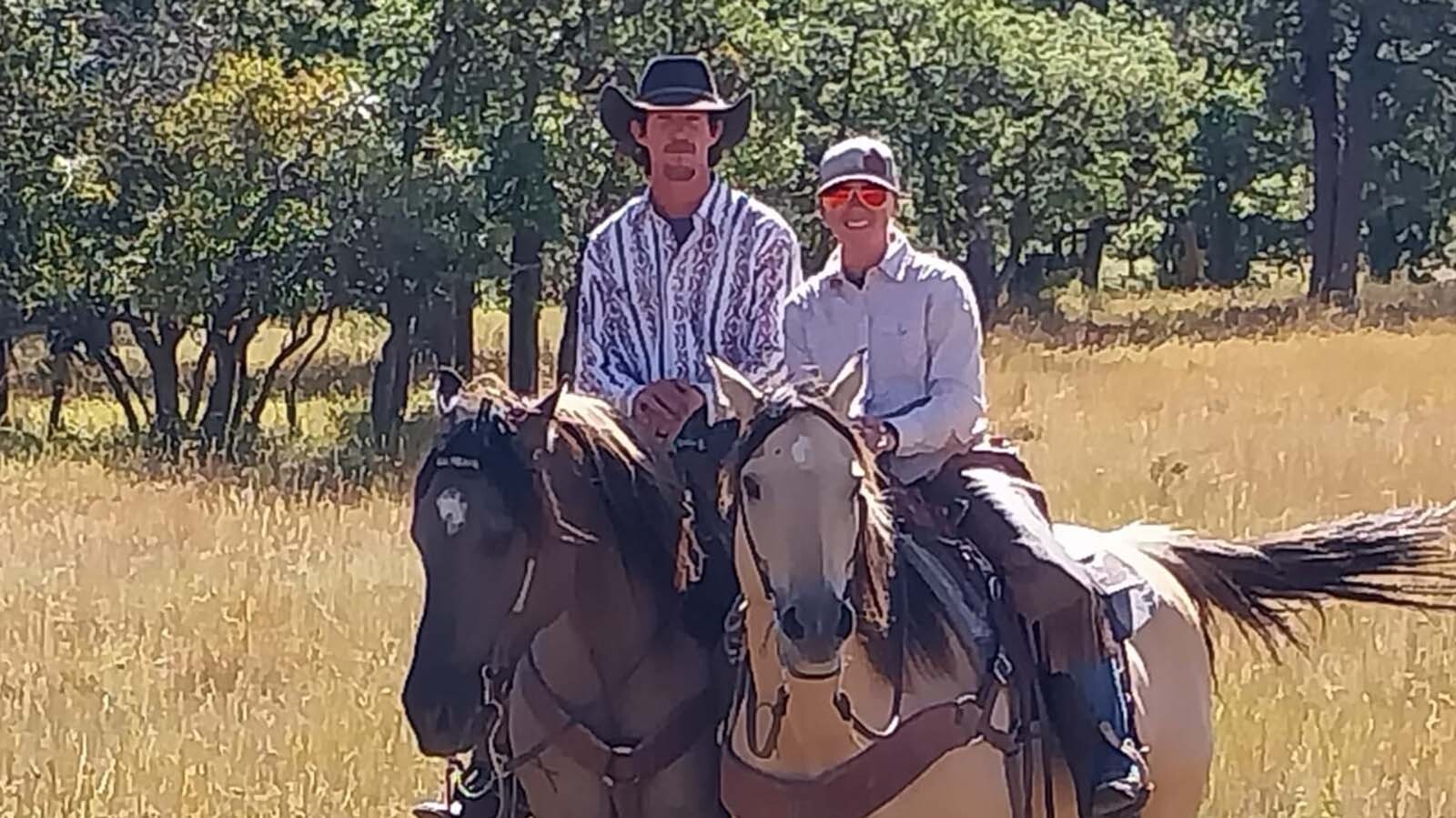 Chase White and his wife Anna riding horses together. Chase was shot through the neck and lungs Oct. 4, and came home from the hospital Oct. 10