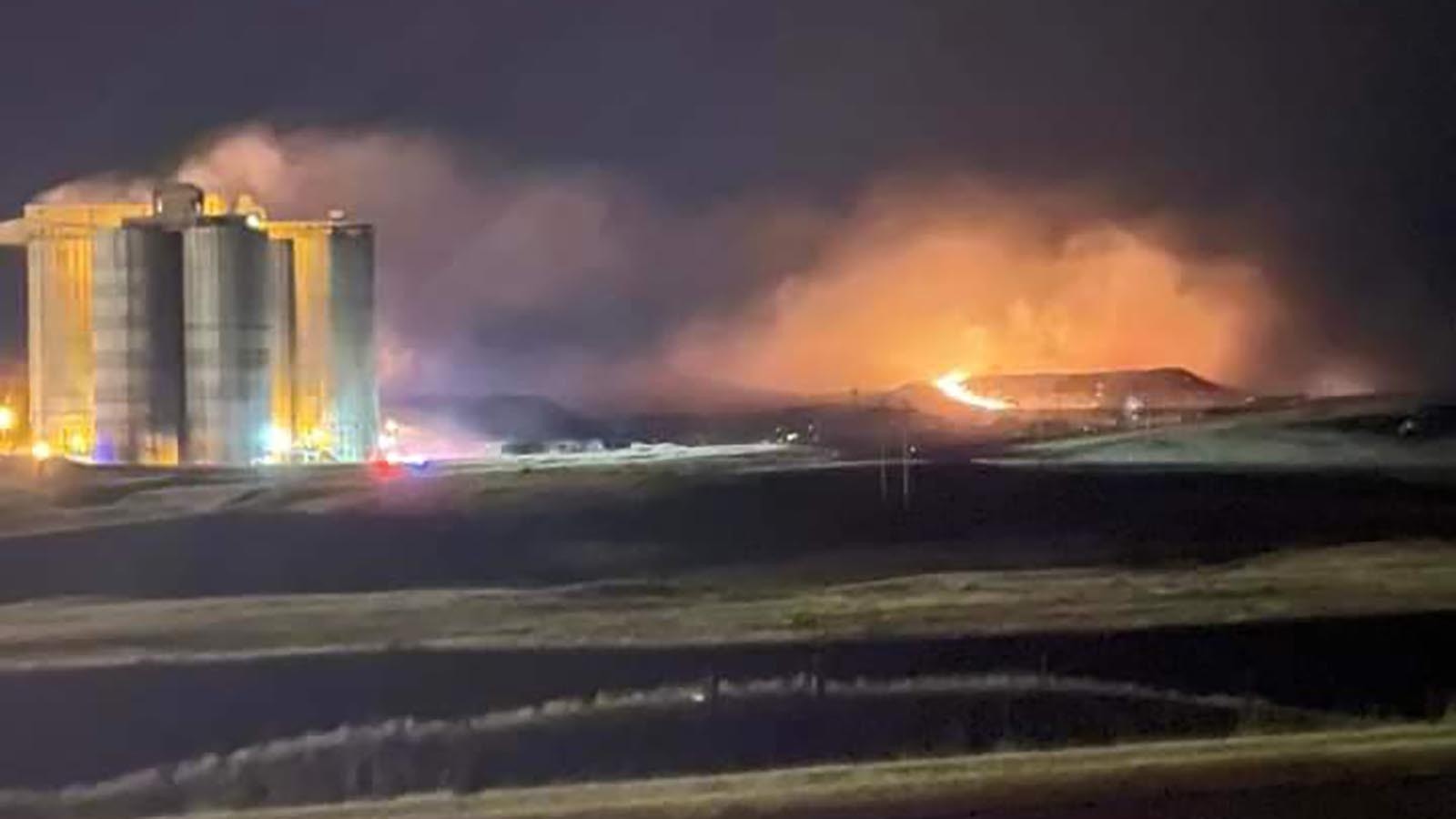 A fire burns near a coal silo Sunday night, Sept. 1, 2024, at the Rawhide mine north of Gillette.