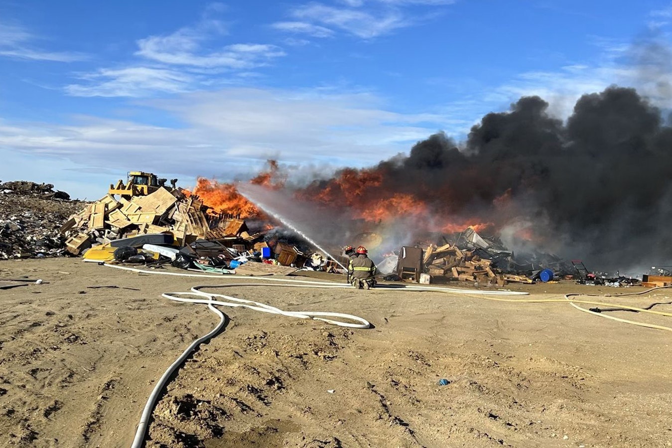 Black smoke billows from a large fire that broke out Saturday afternoon at the Rawlins Landfill.