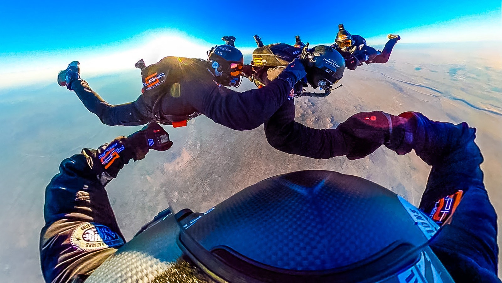 Skydivers in formation set a new world record jumping from more than 38,000 feet over New Mexico.