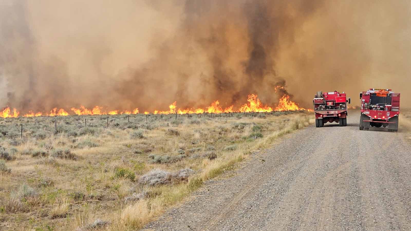 A large, out-of-control wildfire “exhibiting extreme fire behavior” continues to grow in multiple directions about 11 miles east of Thermopolis. The Red Canyon Fire also has prompted more evacuations in its potential path.