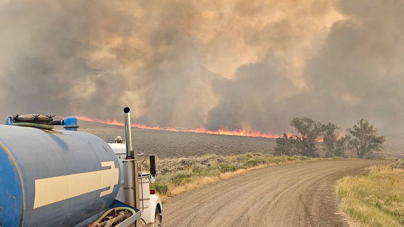 A large, out-of-control wildfire “exhibiting extreme fire behavior” continues to grow in multiple directions about 11 miles east of Thermopolis. The Red Canyon Fire also has prompted more evacuations in its potential path.