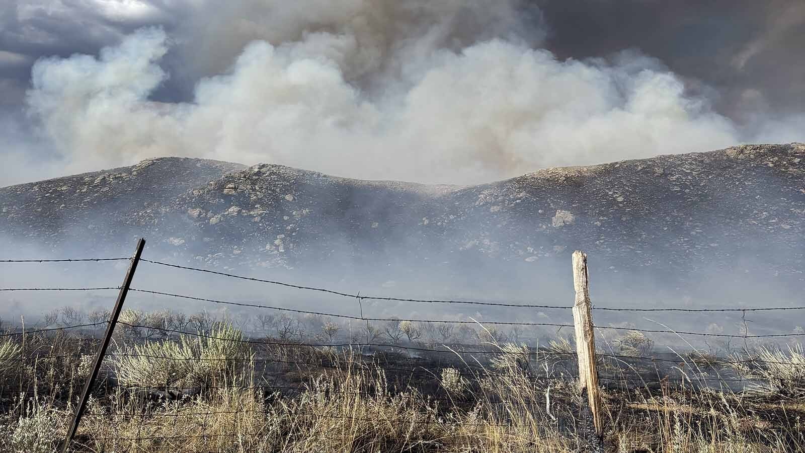 The Red Canyon Fire has crossed fire breaks, roads, creeks and fence lines as hot winds blew it across the rangelands of rural Hot Springs County.