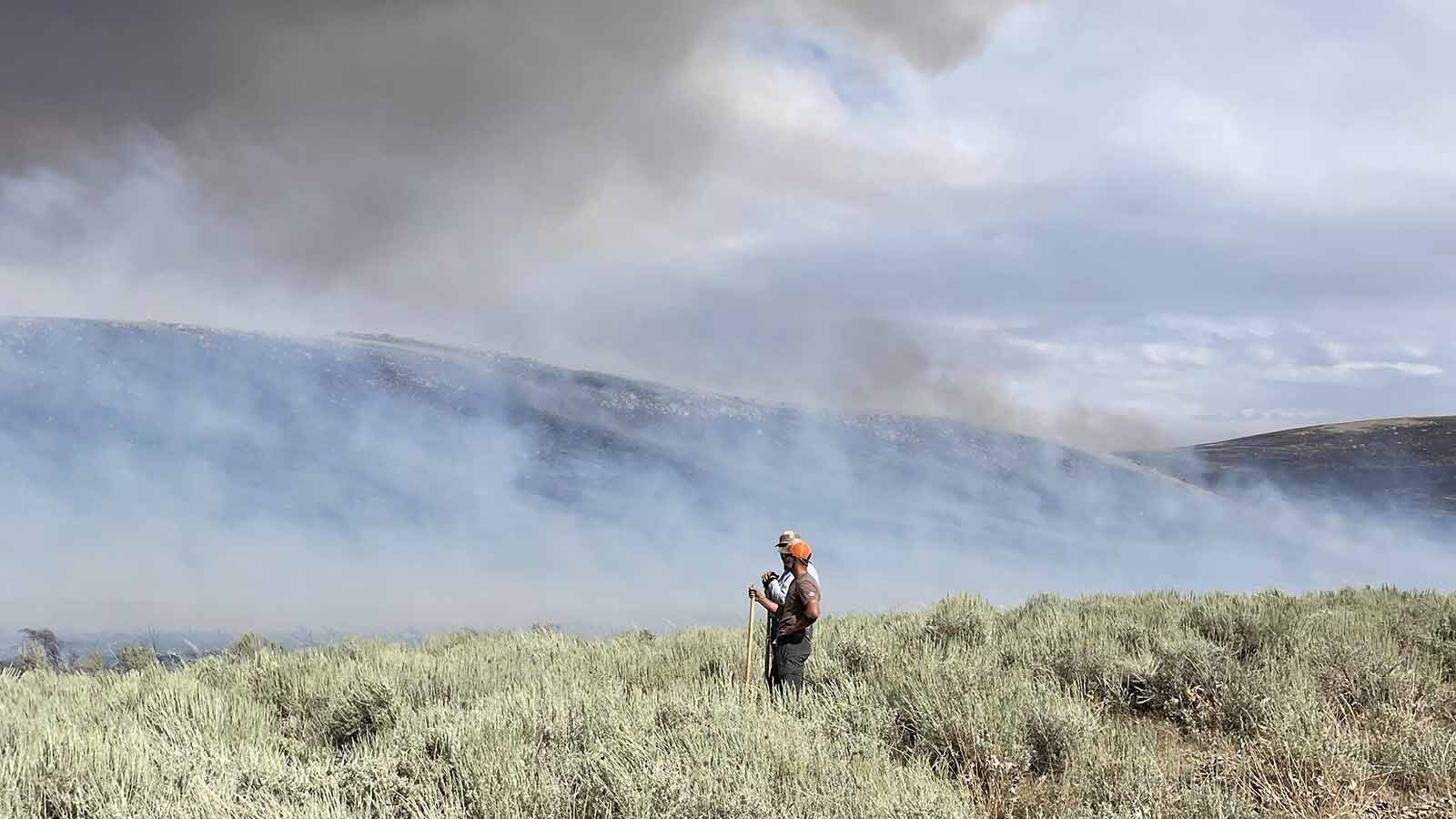 When the Red Canyon Fire blazed out of control, the Axtell family of Thermopolis and a team of neighbors and friends fought back the flames. They dug a fire line three miles from the family’s home and stopped the flames from spreading into the deep ravines and crevices of the Red Hills. By stopping the flames there, it prevented the fire from reaching the Warm Springs and getting close to the Town of Thermopolis.