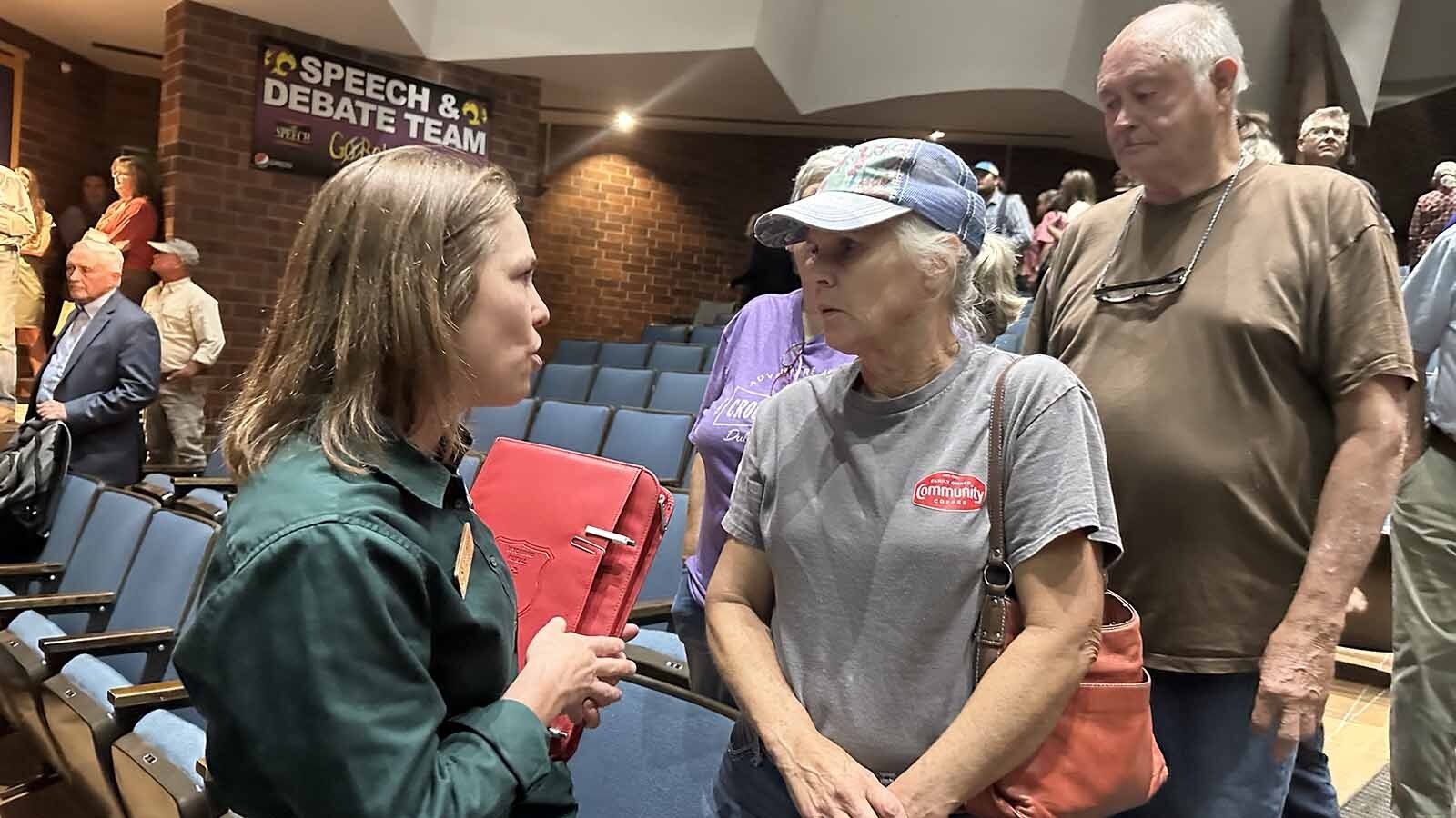 Lindy Linn’s family’s historic ranch is currently surrounded by flames from the Red Canyon Fire and she was one of many ranchers at the town hall meeting in Thermopolis on Monday seeking answers.