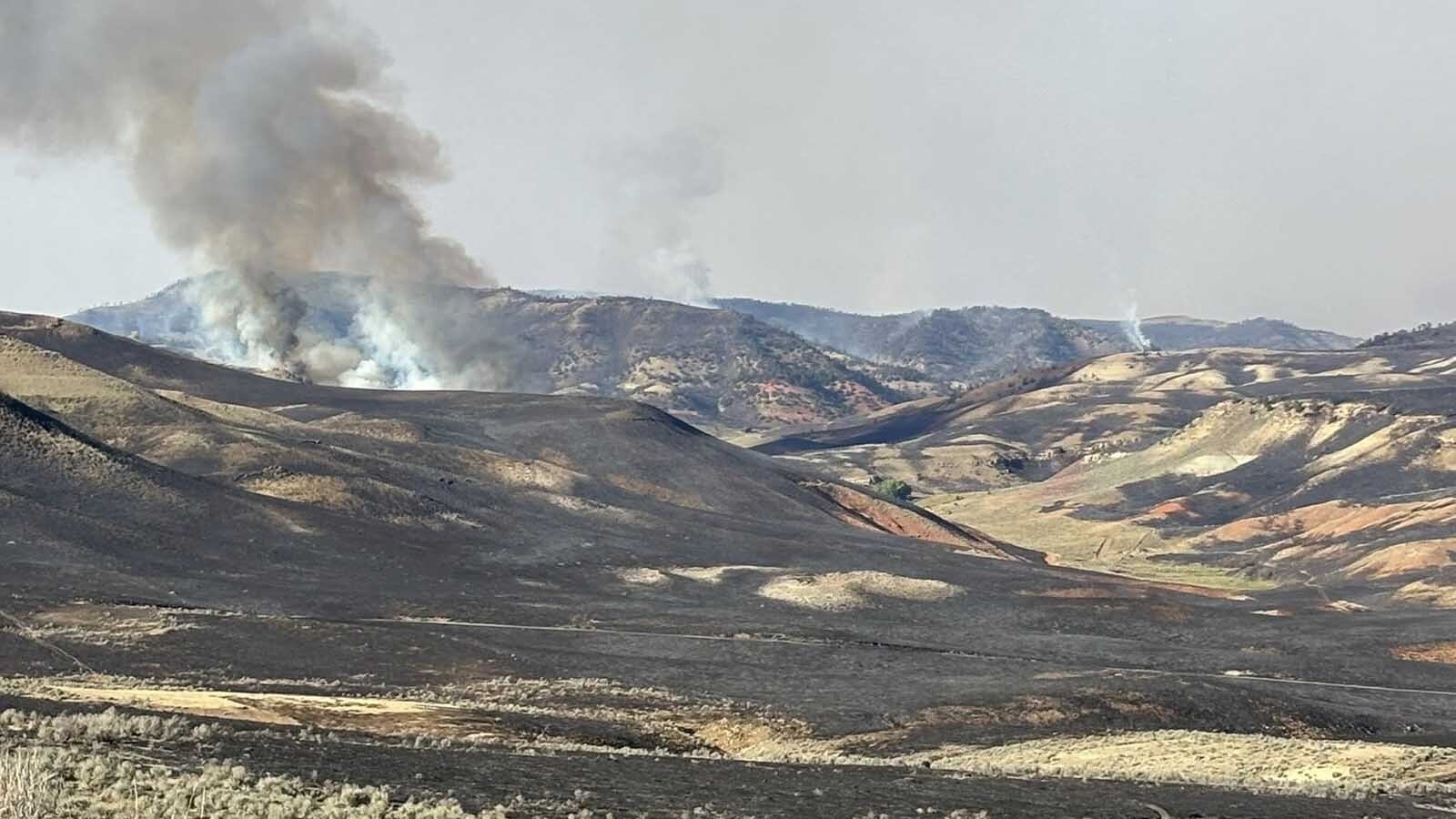 Gloria Philp said her family was fortunate to only lose part of a pasture but their leased land and her neighbors’ pastures were scorched. The winter feed they were dependent on for their cattle and sheep had been burned in the Red Canyon Fire.