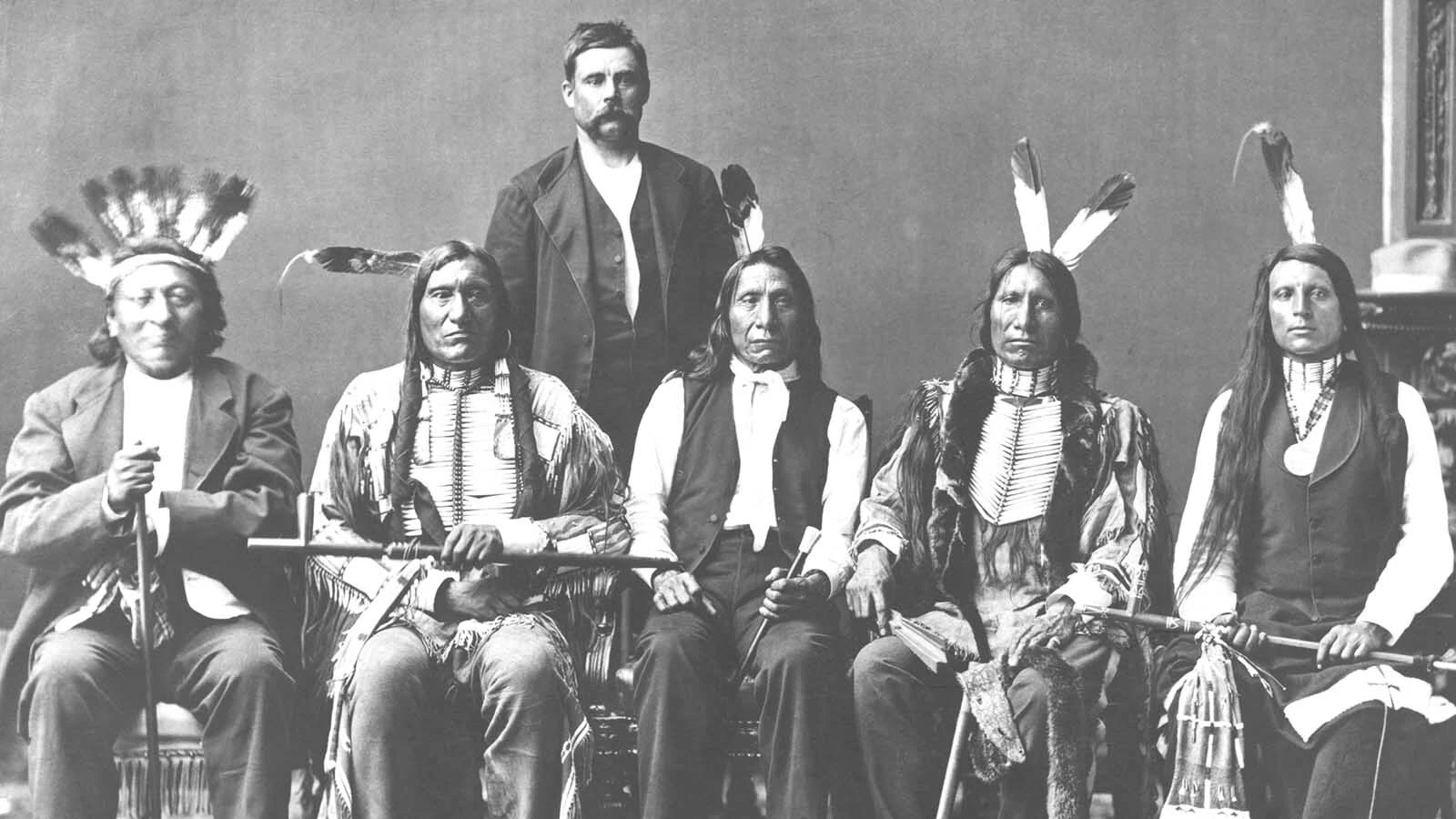 Members of the Red Cloud delegation, left to right: Red Dog, Little Wound, John Bridgeman (interpreter), Red Cloud, American Horse, and Red Shirt in an Oglala Siouxphotograph before 1876.