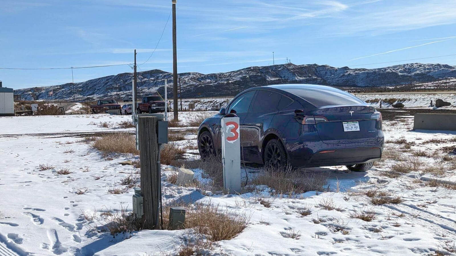 Roger Varley, owner of the Points of Rock Travel Center off Interstate 80 near the Jim Bridger power plant, uses a makeshift charging station at his RV camp to juice up Teslas and other electric vehicles.