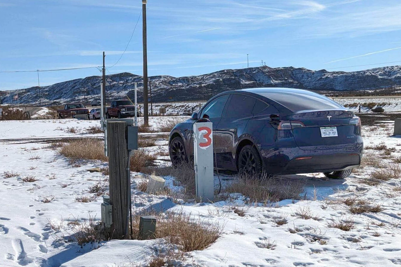 Roger Varley, owner of the Points of Rock Travel Center off Interstate 80 near the Jim Bridger power plant, uses a makeshift charging station at his RV camp to juice up Teslas and other electric vehicles.