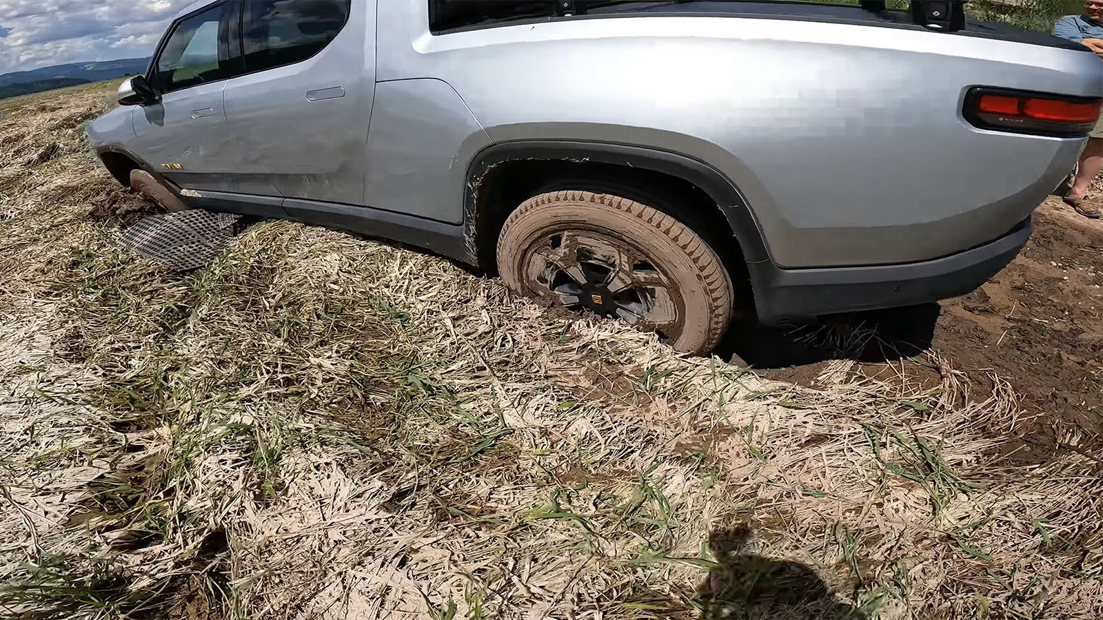 Redneck Rescue responded to pull this Rivian electric vehicle that got itself axel-deep in mud on a Wyoming hot spring.