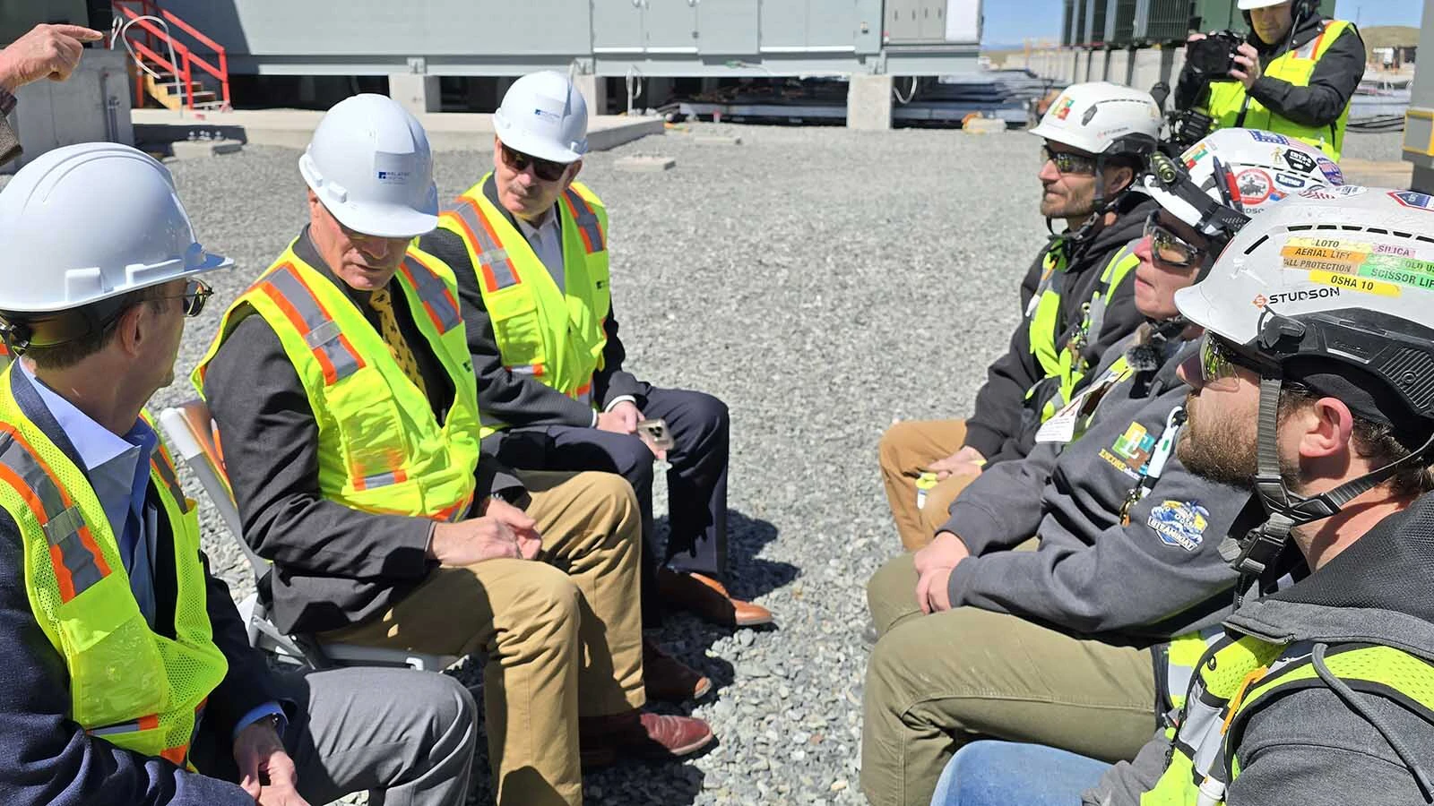 From left, Related Companies CEO Jeff Blau, Gov. Mark Gordon, and Cheyenne Mayor Patrick Collins talk with workers at Related Digital's data center east of Cheyenne.