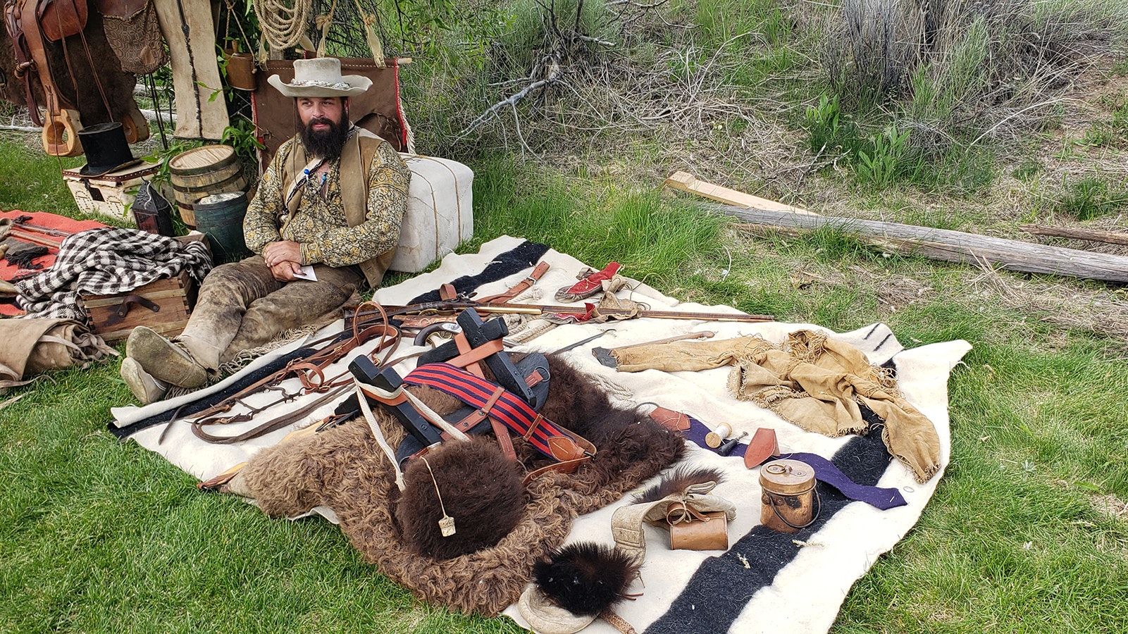 Garrett MacAdams portrays a mobile mountain man camp for a hunter during the recent Green River Rendezvous. Everything shown would easily fit on one horse.